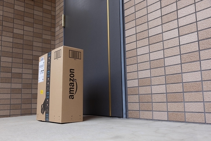 Amazon Lost   Found Amazon package in front of a door. April 7, 2022.