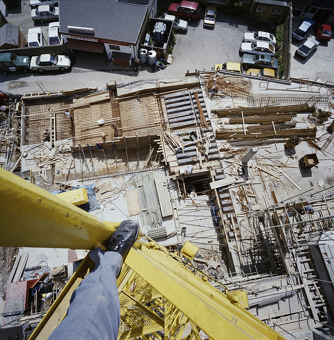 South Norwood Police Station, Oliver Grove, South Norwood, Croydon, London, 04 06 1987. Creator: John Laing plc. South Norwood Police Station, Oliver Grove, South Norwood, Croydon, London, 04 06 1987. An elevated view of the construction site for South Norwood Police Station, from the perspective of a man who is standing on a tower crane. Laing  x2019 s Southern Region was awarded a   xa3 3.8m contract by the Metropolitan Police for the construction of a divisional police station at South Norwood. Work began at the 2100 square metre site in 1986. The structure comprised a reinforced concrete framed building and reinforced concrete basement with brick cladding, services and external works.