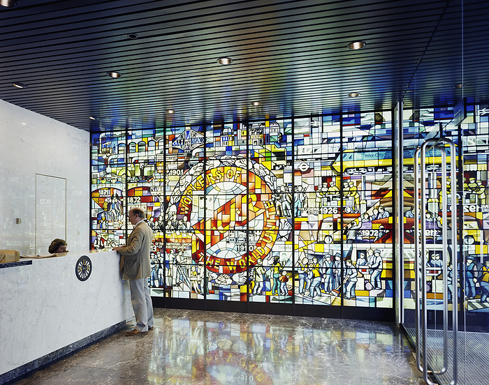 Unity House, Euston Road, Camden, London, 02 06 1983. Creator: John Laing plc. Unity House, Euston Road, Camden, London, 02 06 1983. A reception area at Unity House with a large stained glass mural displaying the history and motto of the National Union of Railwaymen. The contract for the new   xa3 4.5 million headquarters for the National Union of Railwaymen at Euston Road was awarded to Laing  x2019 s London Region. The new headquarters were built on the site of the former Unity House, which had been the home of the National Union of Railwaymen since 1910. Some features of the old building were incorporated into its modern counterpart, including the boardroom  x2019 s leaded cupola skylight and panelling. The six storey building was designed around a courtyard and was located between the Wellcome Foundation Building and the Babcock Building, in the area between Euston Road and Gower Place.