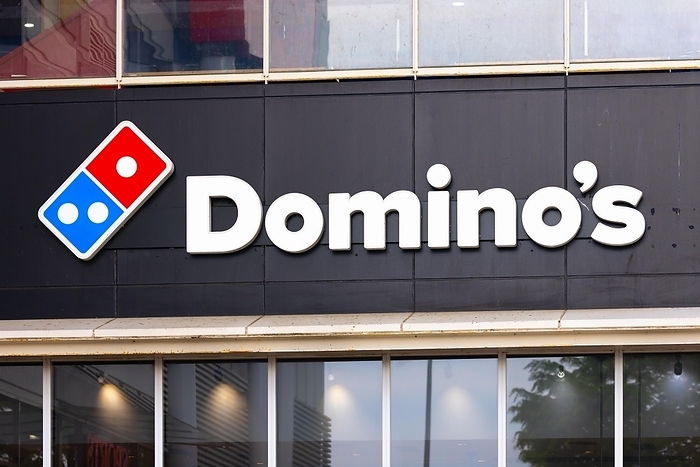 Domino s Pizza Domino s Pizza logo on a store in Yokohama. April 19, 2022.