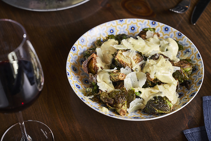Fried brussel sprouts with a parmesan cream sauce.