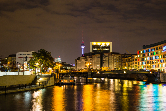 Spree River and illuminated Berlin TV Tower in Berlin, Germany