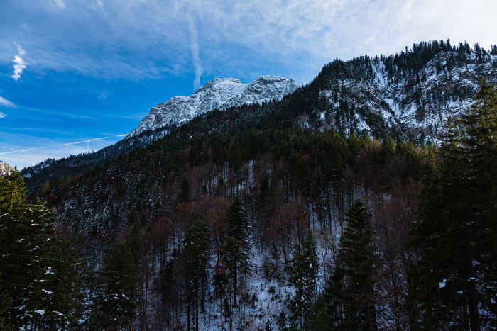 Snow-covered mountains behind Neuschwanstein Castle and the Perath Gorge, Germany