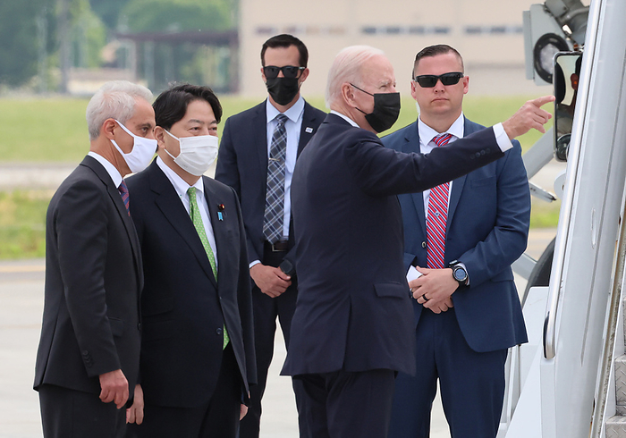U.S. President Visits Japan May 22, 2022, Tokyo, Japan   United States President Joe Biden  2nd R  gestures while U.S. ambassador to Japan Rahm Emanuel  L  and Japanese Foreign Minister Yoshimasa Hayashi  2nd L  look on upon his arrival at the Yokota Air Base in western Tokyo on Sunday, May 22, 2022. Biden will attend the QUAD meeting with leaders of India, Australia and Japan on May 24.    Photo by Yoshio Tsunoda AFLO  