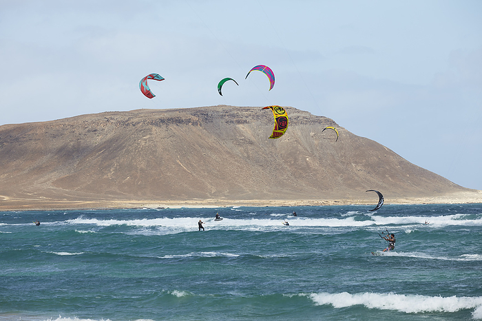 Kite surfing at Costa da Fragata beach, on the east coast of Sal, Cape Verde. Kite surfing at Costa da Fragata beach, on the east coast of Sal, Cape Verde Islands, Atlantic, Africa, Photo by Nigel Hicks
