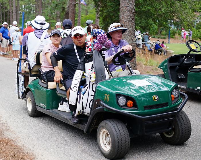 2022 U.S. Women s Open, Day 2 Hinoko Shibuno  second from left  pulls away in her cart after holing out on the second day of the U.S. Women s Open, June 3, 2022 photo date 20220603 location Pine Needles GC, Pine Needles, U.S.A.