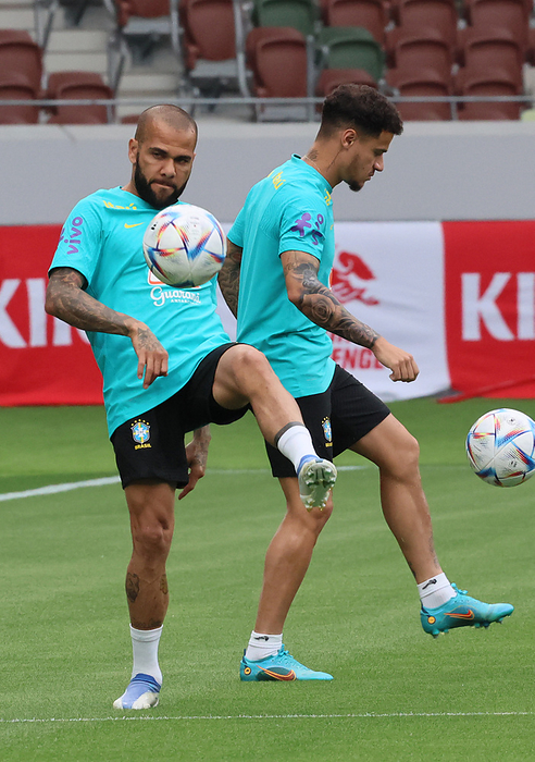 2022 Kirin Challenge Cup Brazil Preparation June 5, 2022, Tokyo, Japan   Brazilian national football team member Daniel Alves warms up with the ball  L  at the official practice for a friendly match against Japan at Japan s national stadium in Tokyo on Sunday, June 5, 2022. Brazil will have international friendly match against Japan on June 6.     Photo by Yoshio Tsunoda AFLO  