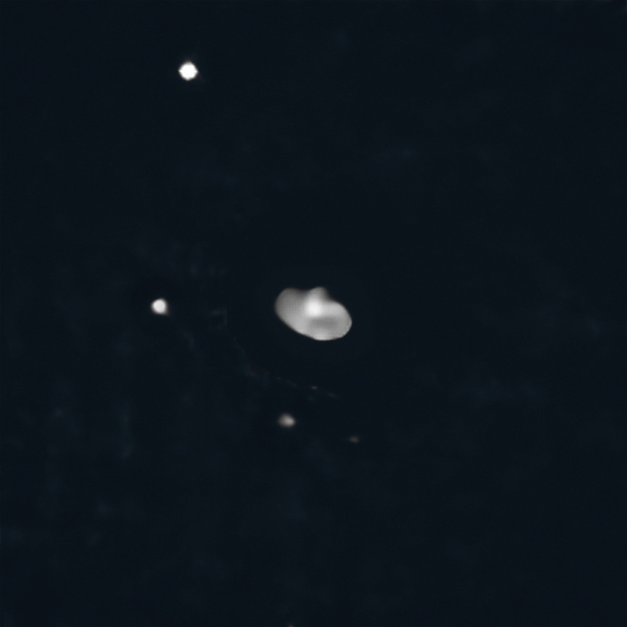 Asteroid Elektra orbited by three moons, VLT image Very Large Telescope  VLT  image taken in 2016 showing the asteroid Elektra  large centre, grey  orbited by three moons. This makes Elektra the first ever quadruple asteroid system to be detected by scientists. The moons orbiting Elektra have been named S 2014  130  2  bottom , S 2014  130  1  centre left  and S 2003  130  1  top left . Observations taken with the Spectro Polarimetric High contrast Exoplanet REsearch  SPHERE  instrument on ESO s Very Large Telescope  VLT .  , by EUROPEAN SOUTHERN OBSERVATORY SCIENCE PHOTO LIBRARY