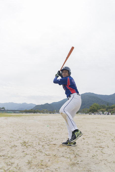 A nice young man swinging with beautiful batting form