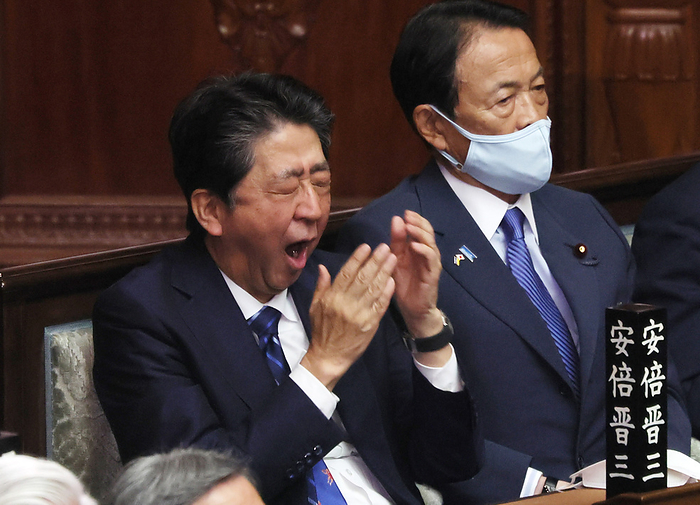 Plenary Session of the Diet, House of Representatives June 9, 2022, Tokyo, Japan   Former Japanese Prime Minister Shinzo Abe  L  gives a yawn while Taro Aso looks on  R  at Lower House s plenary session at the National Diet in Tokyo on Thursday, June 9, 2022. Japan s main opposition Constitutional Democratic Party of Japan submitted no confidence resolutions to Kishida s cabinet and scandal hit parliament speaker Hiroyuki Hosoda but Lower House voted down both no confidence motions.     Photo by Yoshio Tsunoda AFLO  