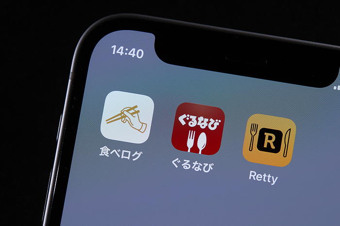 smartphone app The logos of mobile apps Tabelog, Gurunavi, and Retty, are displayed on a screen in Tokyo, Japan, June 23, 2022.  Photo by AFLO 