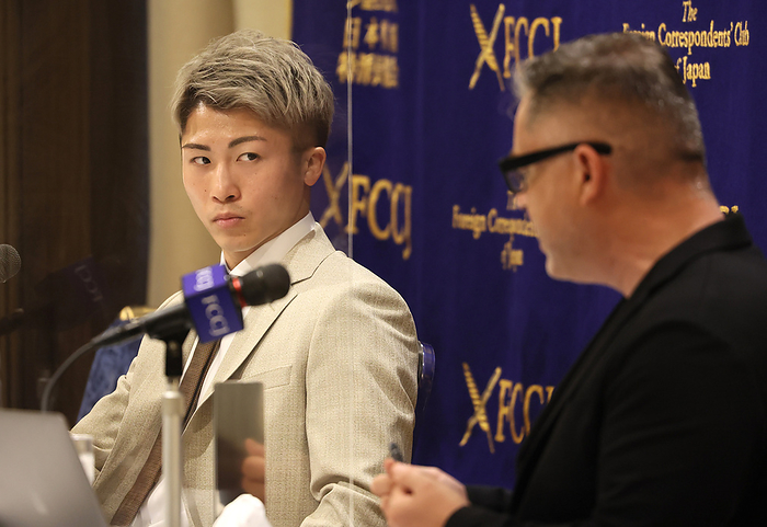 WBA, WBC, IBF champion Naoya Inoue speaks at the FCCJ June 27, 2022, Tokyo, Japan   Japanese professional boxer  Monster  Naoya Inoue  L , holding WBA, WBC and IBF belts, listens to a question at the Foreign Correspondents  Club of Japan in Tokyo on Monday, June 27, 2022. Inoue defeated WBC champion Nonito Donaire of Philippines by TKO this month and became the first Japanese boxer for the pound for pound top ranker by Ring boxing magazine.       Photo by Yoshio Tsunoda AFLO 