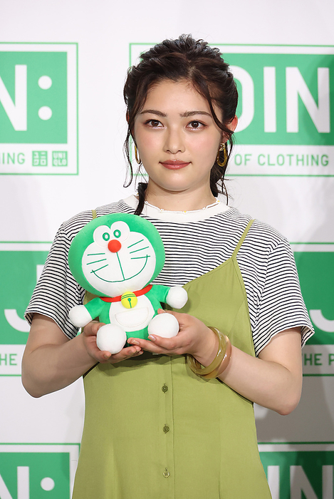 Uniqlo will start a sustainable campaign  JOIN: The Power of Clothing  June 29, 2022, Tokyo, Japan   Japanese actress Sakura Inoue poses for photo with a doll of Doraemon made of recycle plastic material as she attends fast fashion giant Uniqlo s sustainable campaign  JOIN: the Power of Clothing  in Tokyo on Wednessday, June 29, 2022. Uniqlo will start a global environmental campaign using recycle materials and they donate 1 million USD to Nippon Foundation to reduce marine debris.       Photo by Yoshio Tsunoda AFLO 