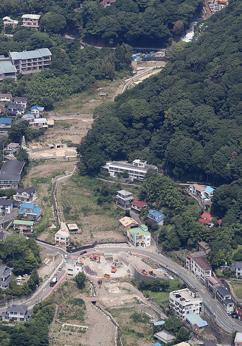 Atami City, one year after the mudslide disaster The disaster site one year after the mudslide. Below is the site of the Marukoshi Sake Shop, which was filmed being hit by a mudslide at the time of the occurrence, symbolizing the damage, in Atami City, Shizuoka Prefecture, July 2, 2022. Photo taken by Yuki Miyatake at 10:50 a.m. from the head office helicopter.