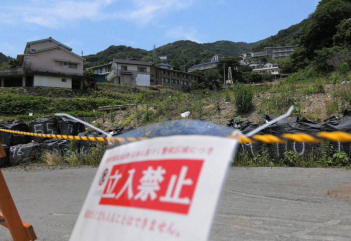 Atami City, one year after the mudslide disaster One year after the mudslide disaster, a large area of the affected region has been designated as a warning zone and access to the area, including residents, has been restricted.