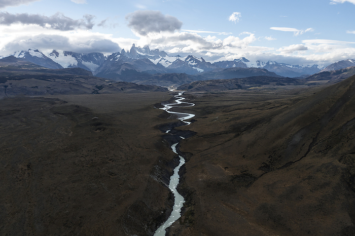 A small river winds its way out of the Patagonian mountains.