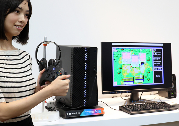 NEC brand re enters the gaming PC market July 5, 2022, Tokyo, Japan   A model displays Japan s personal computer maker NEC Personal Computer s new gaming PC  Lavie GX 750  at a presentation of NEC PC s new products in Tokyo on Tuesday, July 5, 2022. Lavie GX 750 is the 40th anniversary model of NEC PC s legendary PC9801, the most popular 16 bit PC and a total of 18.3 million units were shipped from 1982 thtough 2003.       Photo by Yoshio Tsunoda AFLO  