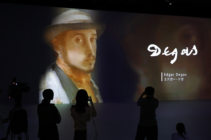 70 masterpieces of Impressionist painters are displayed with digital effects at the  Immersive museum  July 7, 2022, Tokyo, Japan   Journalists admire 70 masterpieces of Impressionist painters in the 19th Century are projected on the 6m tall large walls with digital effects at a press preview of the  Immersive museum  in Tokyo on Thursday, July 7, 2022. The digital art event  Immersive museum  will be held from July 8 through October 29.      Photo by Yoshio Tsunoda AFLO 