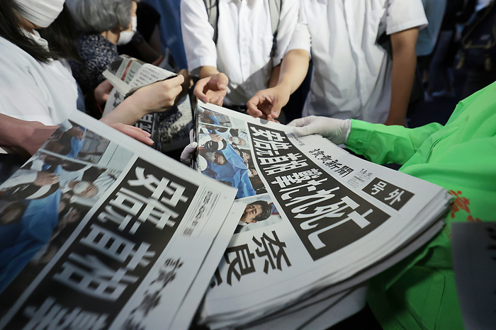 Former Japan PM Shinzo Abe assassinated during election event Copies of an extra edition of a newspaper are handed out in Tokyo s Yurakucho district on July 8, 2022 showing the news that Japan s former Prime Minister Shinzo Abe has died after being shot at an election campaign event in Nara earlier during the day. Abe was Japan s longest serving prime minister holding the post up until 2020 before stepping down for health reasons.  Photo by Naoki Morita AFLO 