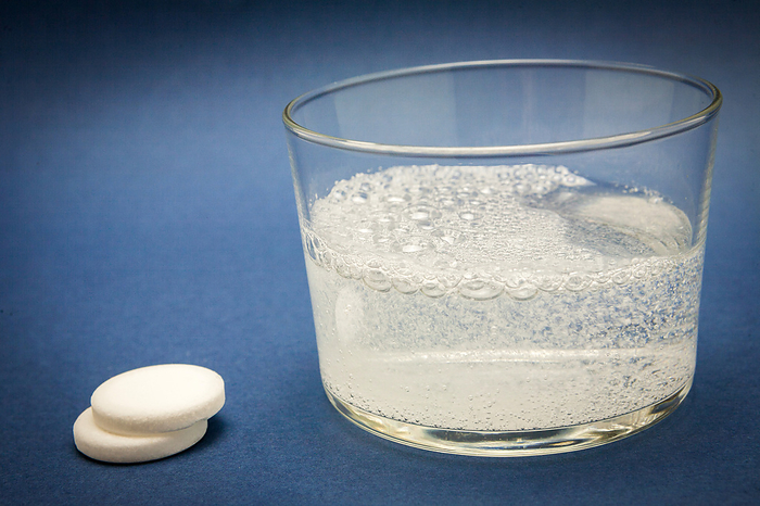 Effervescent tablet into glass of water Effervescent tablet into glass of water., by DIGICOMPHOTO SCIENCE PHOTO LIBRARY