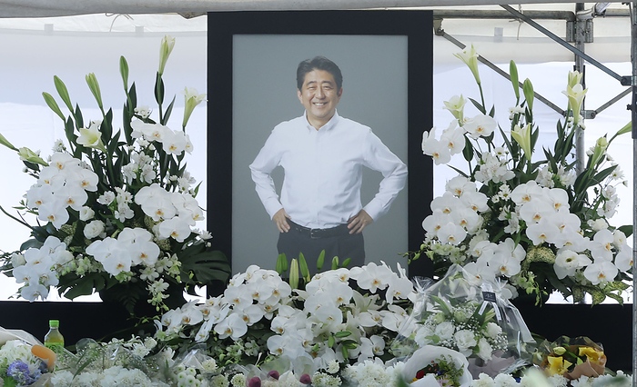 Former Prime Minister Abe dies from gunshot wounds at wake at Zojoji Temple. Wake of former Prime Minister Shinzo Abe Floral tribute table for the public