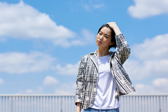 Blue sky and Japanese woman