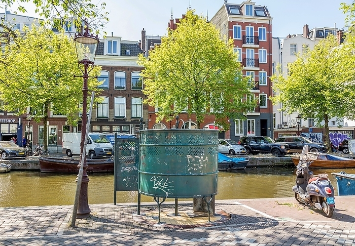 Traditional canal side public street urinal in Central Amsterdam Traditional canal side public street urinal in Central Amsterdam, North Holland, The Netherlands, Europe, Photo by Barry Davis
