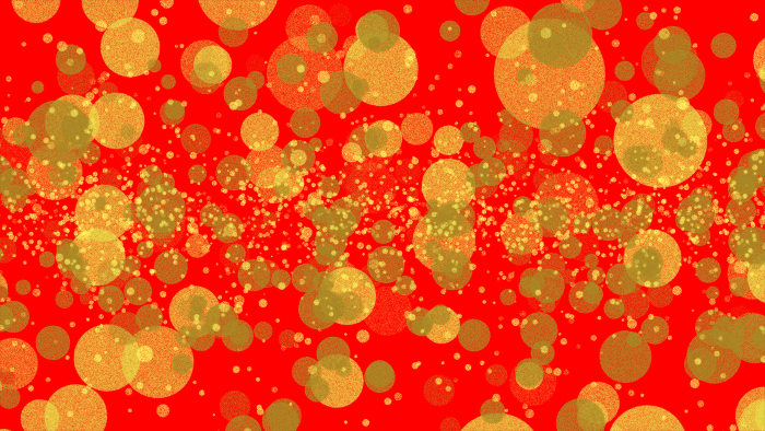 Scattered gold glittering circles on red background