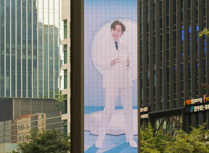 Commercial video featuring BTS in Seoul  Commercial video featuring BTS, July 5, 2022 : A commercial video featuring BTS advertising a new water purifier of Coway is seen on an ad screen on the street in central Seoul, South Korea.  Photo by Lee Jae Won AFLO   SOUTH KOREA 