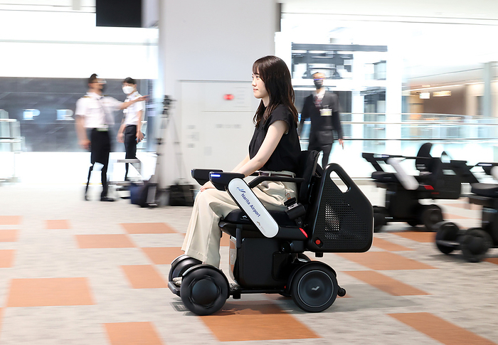 WHILL to Conduct Automated Driving Demonstration at Narita Airport: Linking with Elevators for Hierarchical Movement July 28, 2022, Narita, Japan   Japan s high tech venture Whill demonstrates the company s autonomous driving personal mobility  Whill C2  to carry passengers at the terminal 2 of Narita International Airport in Narita, suburban Tokyo on Thursday, July 28, 2022. Whill started a field test of the personal mobility service between a station and boarding gates which including using an elevator.       Photo by Yoshio Tsunoda AFLO  