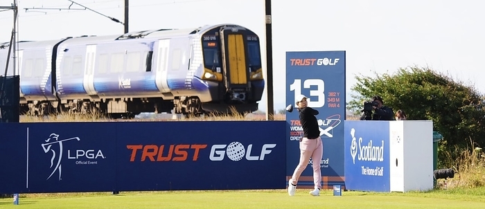 2022 Scottish Women s Open, Day 2  Scottish Women s Open, Day 2 A train passes behind Hinoko Shibuno as she shoots her tee shot on the 13th in the second round  Photo by Daisuke Nishio .