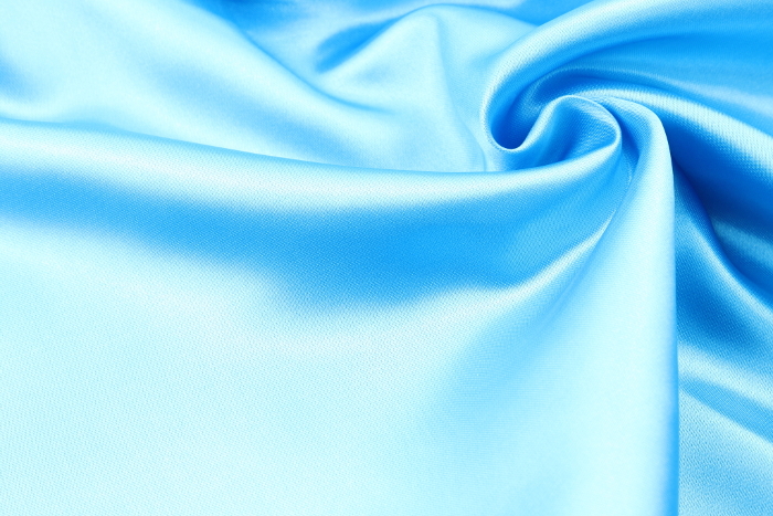 Blue satin fabric drape