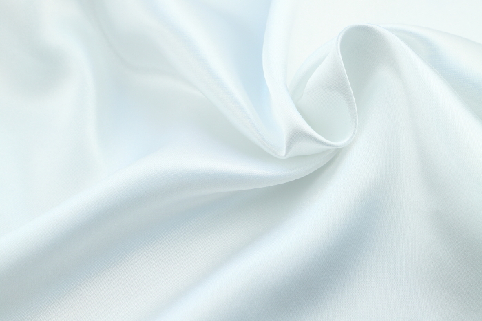 White satin fabric drape