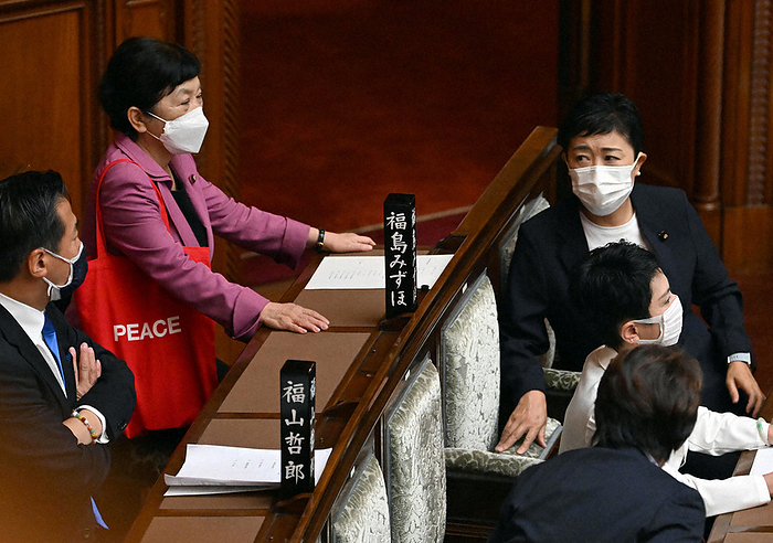 Mizuho Fukushima, leader of the Social Democratic Party, and Kiyomi Tsujimoto of the Constitutional Democratic Party of Japan attend a plenary session of the upper house of the Diet. Mizuho Fukushima  back left , leader of the Social Democratic Party, and Kiyomi Tsujimoto  right , leader of the Constitutional Democratic Party of Japan, attend a plenary session of the upper house of the Diet at 11:31 a.m. on August 5, 2022.