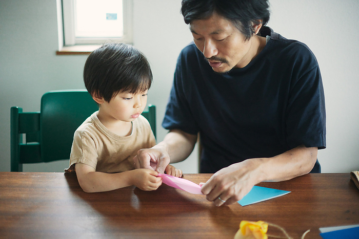Japanese parent and child folding origami