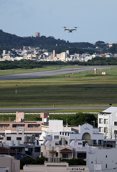 MV22 Osprey taking off and landing at the U.S. Army s Futenma Airfield MV 22 Osprey taking off and landing at the U.S. Futenma Air Station in Ginowan City, Okinawa Prefecture, 202  Photo by Shinnosuke Kyanobu at 5:44 p.m. on August 19, 2002 