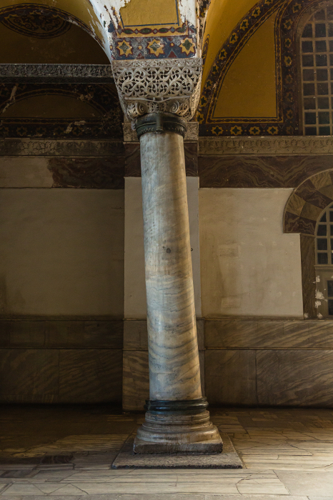 Leaning columns inside the Hagia Sophia in the old city of Istanbul, Turkey.