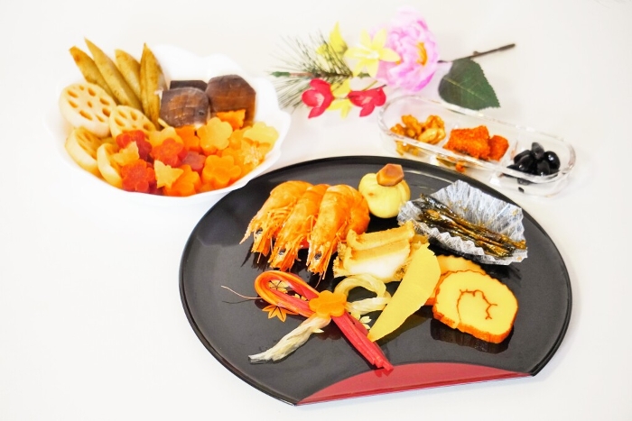 Oseki-ryori eaten during the Japanese New Year on a white background
