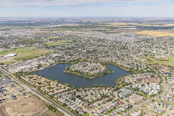 Aerial view of Beaumaris Lake and cityscape in Edmonton, Alberta Canada which serves as both a stormwater lake and recreation destination; Edmonton, Alberta, Canada, Photo by Rick Boden & Marilyn Ledingham / Design Pics