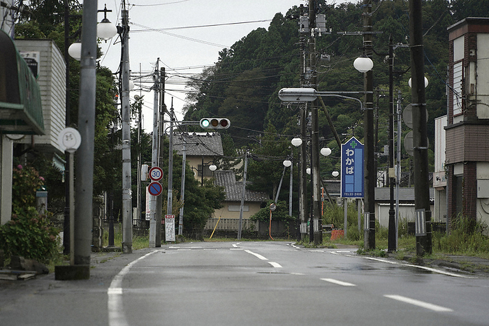 Evacuation lifted after 11 years and 5 months Reconstruction base in Futaba Town The streets in the center of the town were quiet on August 30, the day the evacuation order was lifted from the Specified Reconstruction and Revitalization Zone.  Photo by Naoki Watanabe, 7:35 a.m., August 30, 2010 