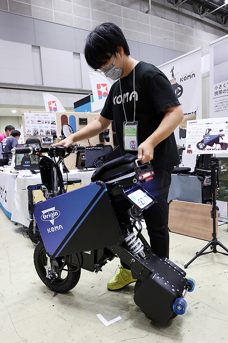 A two day DIY exhibition Maker Fair Tokyo is held  September 3, 2022, Tokyo, Japan   Foldable motorcycle maker Icoma owner Takamitsu Ikoma displays his latest transformable electric motorcycle  Tatamel Bike  at an annual DIY exhibition Maker Faire Tokyo in Tokyo on Saturday, September 3, 2022. The trunk sized electric motorcycle can cruise on the public road regally in Japan.     Photo by Yoshio Tsunoda AFLO 