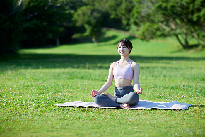 Japanese women doing yoga in summer