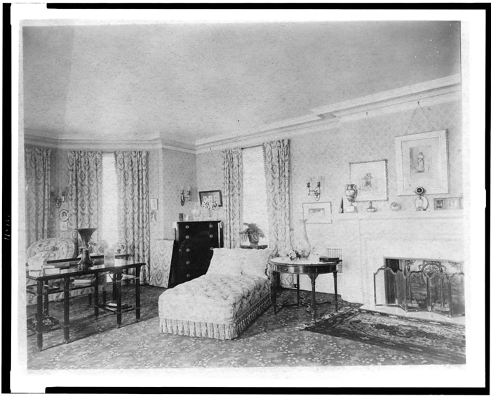 Bedroom with fireplace, and padded chaise longue, in home of...Greenwich, Connecticut, 1908. Creator: Frances Benjamin Johnston. Bedroom with fireplace, and padded chaise longue, in home of Edmund Cogswell Converse, Greenwich, Connecticut, 1908. The Conyers Farm estate, designed by Donn Barber c1904, was owned by businessman Edmund C. Converse.