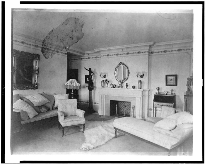 Bedroom with fireplace, padded chaise longue, sofa, male nude..., Greenwich, Connecticut, 1908. Creator: Frances Benjamin Johnston. Bedroom with fireplace, padded chaise longue, sofa, male nude statuette, and polar bear rug, in home of Edmund Cogswell Converse, Greenwich, Connecticut, 1908. The Conyers Farm estate, designed by Donn Barber c1904, was owned by businessman Edmund C. Converse.