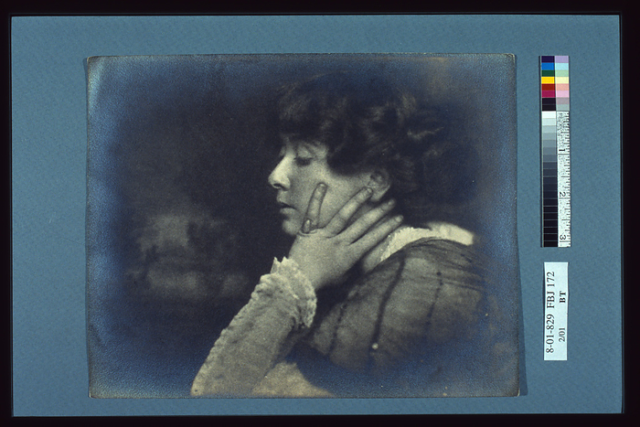 Woman resting her head on her left hand, head and shoulders profile portrait, c1900. Creator: Unknown. Woman resting her head on her left hand, head and shoulders profile portrait, c1900. Photographer unidentified.