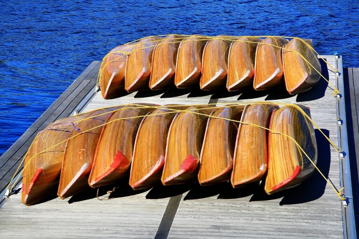 Landed wooden canoe