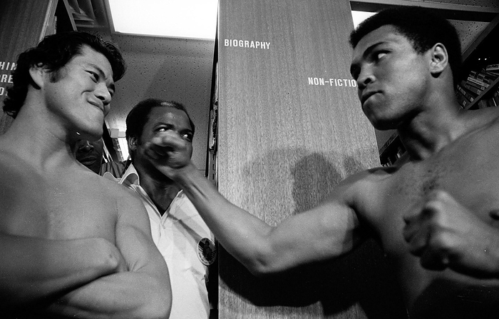 Antonio Inoki,  The Burning Spirit of Fighting,  passed away  June 1976 file photo  Foreign Correspondents  Club press conference Muhammad Ali  right , who came to Japan for a different kind of martial arts match, poses to punch Antonio Inoki at a press conference at the Foreign Correspondents  Club  197 .  Date unknown  Muhammad Ali  Date 19760601  Location Foreign Correspondents  Club