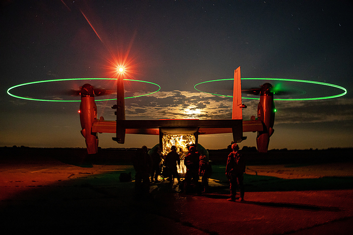 US marines and sailors boarding a CV 22 Osprey U.S. Marines and sailors with 2d Reconnaissance Battalion attached to Task Force 61 2 and sailors with Explosive Ordnance Disposal Mobile Unit 8 board a CV 22 Osprey with 7th Special Operations Squadron near Mildenhall, England, United Kingdom, June 16, 2022., by U.S. Marine Corps photo by Sgt. Dylan Chagnon US DEPARTMENT OF DEFENSE SCIENCE PHOTO LIBRARY
