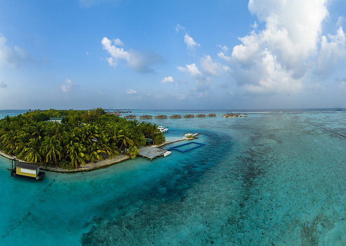 Maldives, North Male Atoll, Lankanfushi, Aerial view of tourist resort on small tropical island