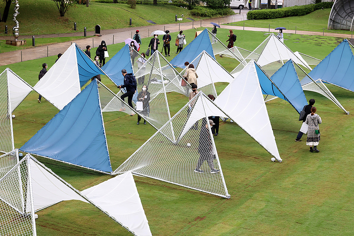 An annual design event Tokyo Midtown Design Touch starts October 14, 2022, Tokyo, Japan   A large installation  Sea Hammock  formed by tarps and fishnets created by Japanese architect Yuko Nagayama is displayed on the lawn field as a part of the  Tokyo Midtown Design Touch 2022  in Tokyo on Friday, October 14, 2022. An annual design event with the theme of  Design for Sustainable Future  started at the Tokyo Midtown through November 3.       Photo by Yoshio Tsunoda AFLO 